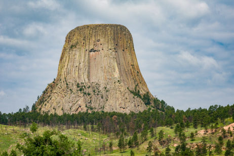 Reaching 867 feet from base to summit, Devils Tower pops out like a giant tree stump in the Northern Black Hills in Eastern Wyoming.