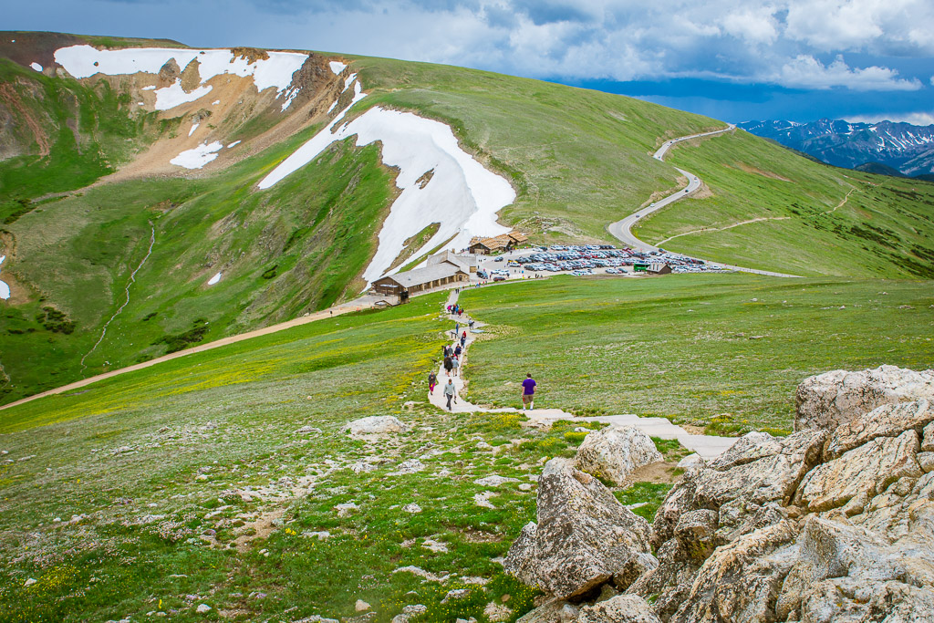 The Alpine Visitor Center at 11,796 feet above sea level sits alongside snowfields and the Trail Ridge Road in Colorado's Rocky Mountain National Park.