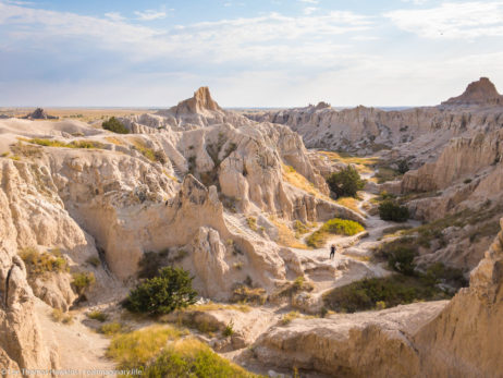 Becky awaits my return after I hiked the section above the ladder on the Notch Trail in Badlands National Park.
